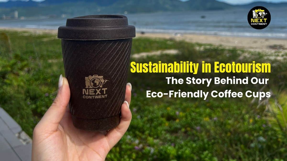 Reusable eco-friendly coffee cup with Da Nang bay and beach in the background