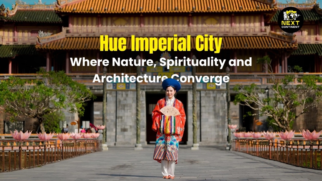 A Vietnamese woman wearing a traditional áo dài stands gracefully in front of the majestic gates of Hue Imperial City, blending culture, architecture, and history.