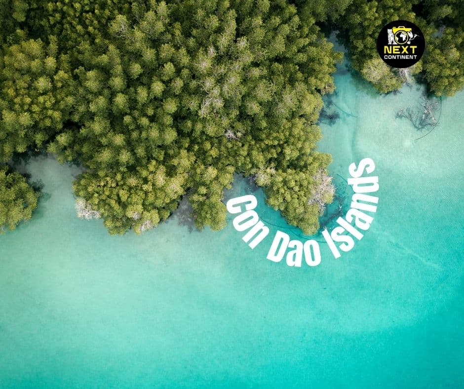 Aerial view of Con Dao Islands showing mangroves and azure shallows along the coast