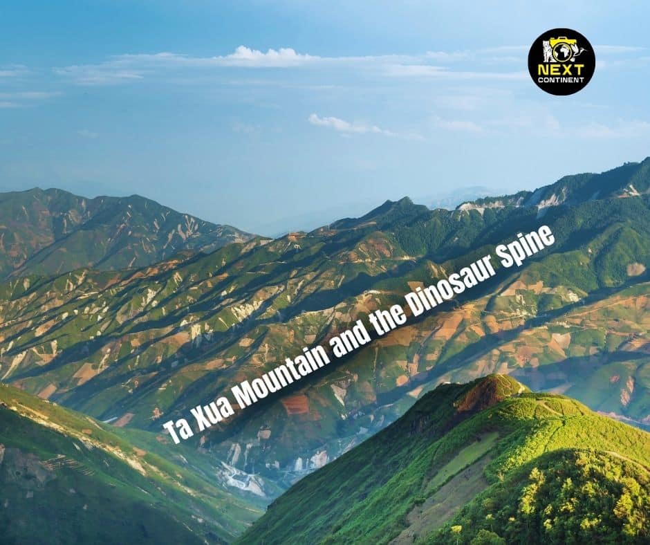 Scenic view of Ta Xua Mountain and the Dinosaur Spine, with a blue sky and clouds above the green mountain peaks