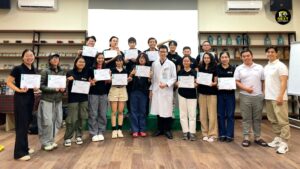A group of people showcasing their First-Aid Training Certificate
